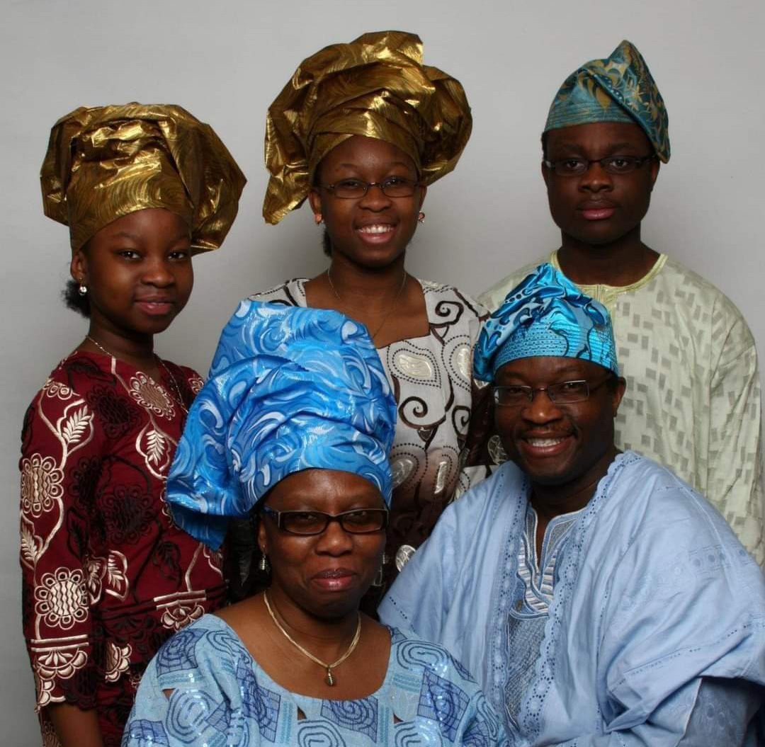Family portrait with Oghosa&rsquo;s parents and two younger sisters.